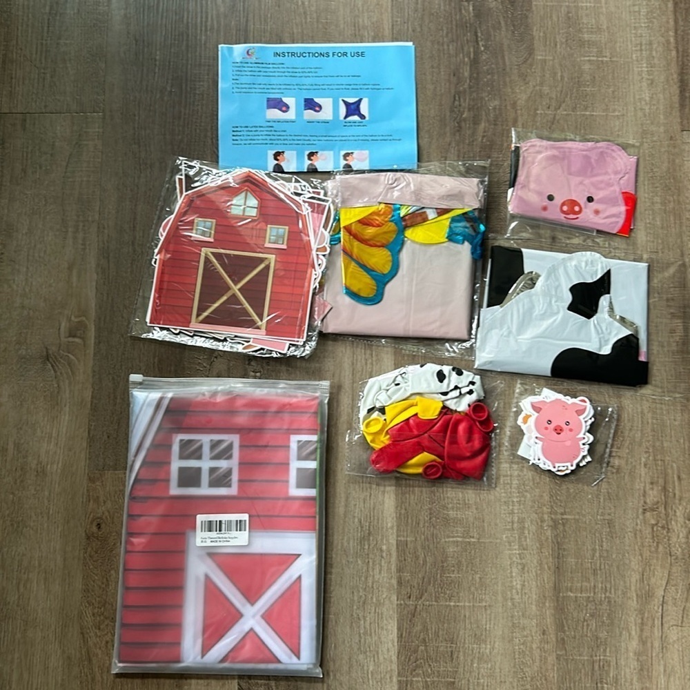 Farmyard themed party supplies foil balloons cupcake toppers table cloth banners